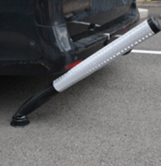 Quick-flex bollard being flexed by a car
