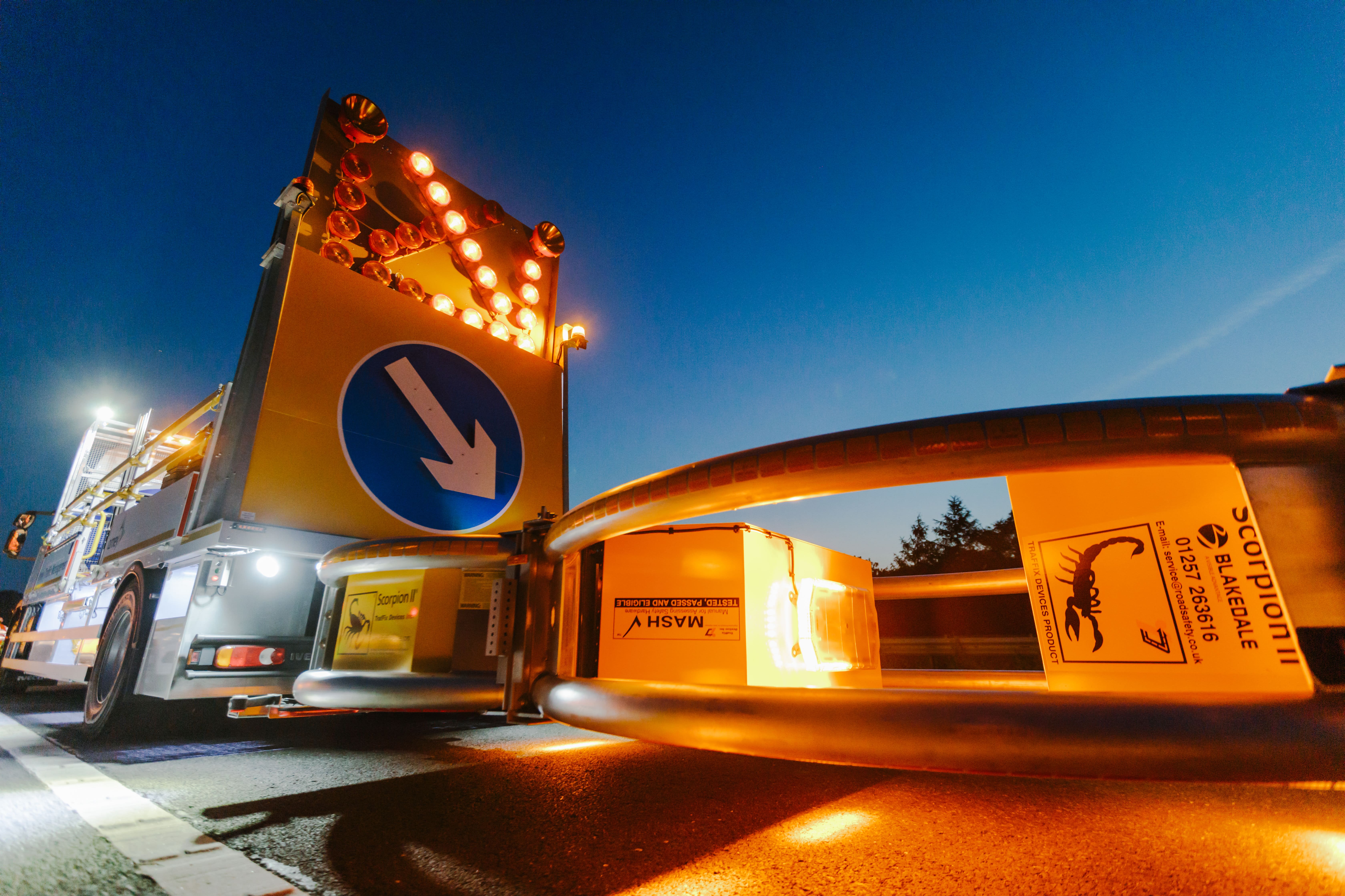 Impact Protection Vehicle with Crash Cushion Down